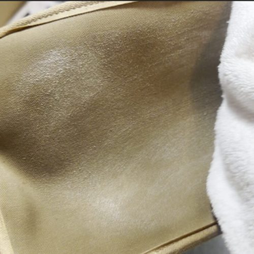 Wiping down the dirt on the LV Neverfull